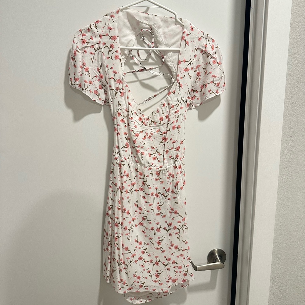 White dress with Pink floral details from white Fox boutique